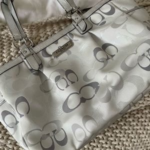 Well loved silver cloth shoulder bag with lots of pockets